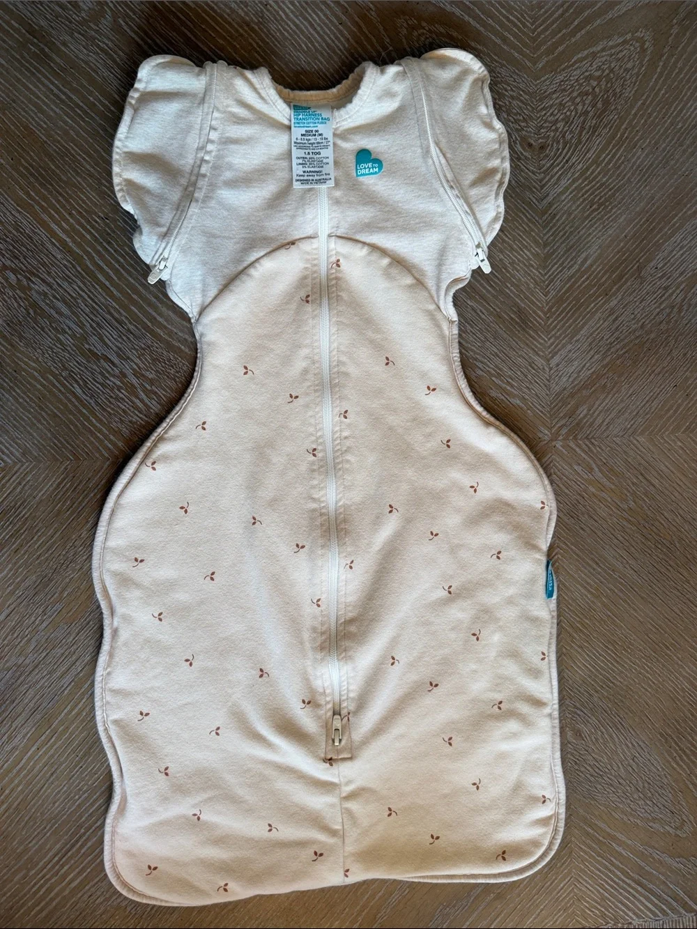 Love to dream Beige Transition Swaddle with zip off wings. 1.5 TOG.